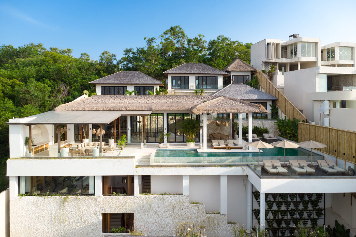 Maison Ulu Satu, the six-suite villa, set into the hillside.